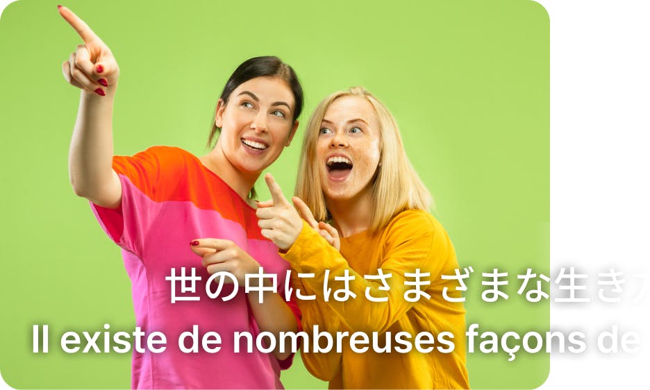 two girls pointing at the left side of the screen with multilingual subtitles at the bottom