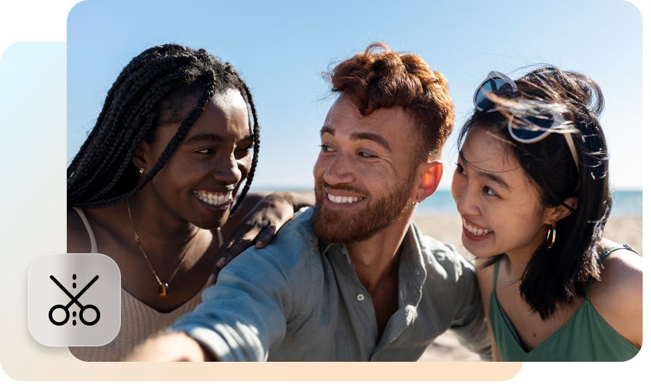 three people taking a selfie and smiling at each other