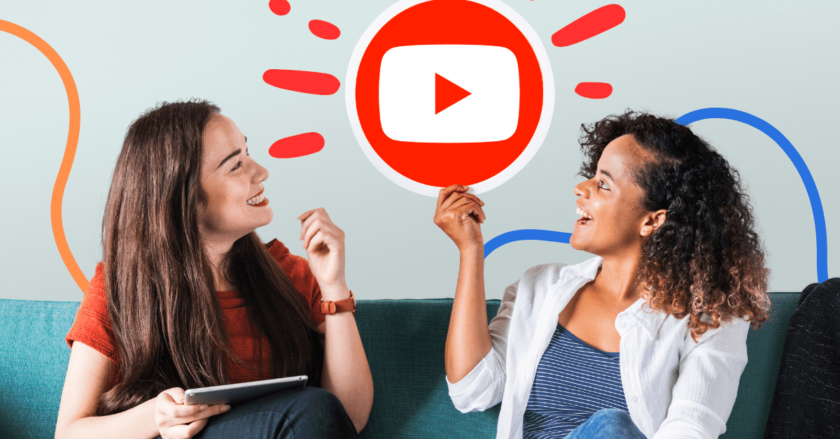 Two women pointing to a YouTube play button