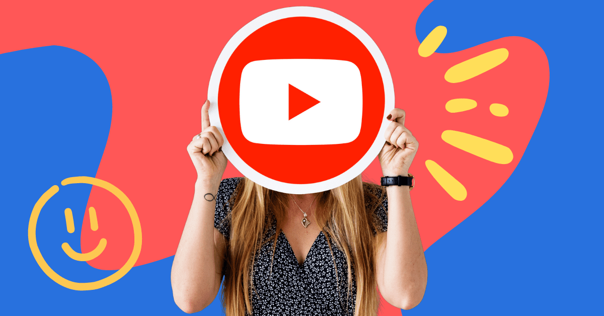 a woman with long brown hair is holding a YouTube play button infront of her face