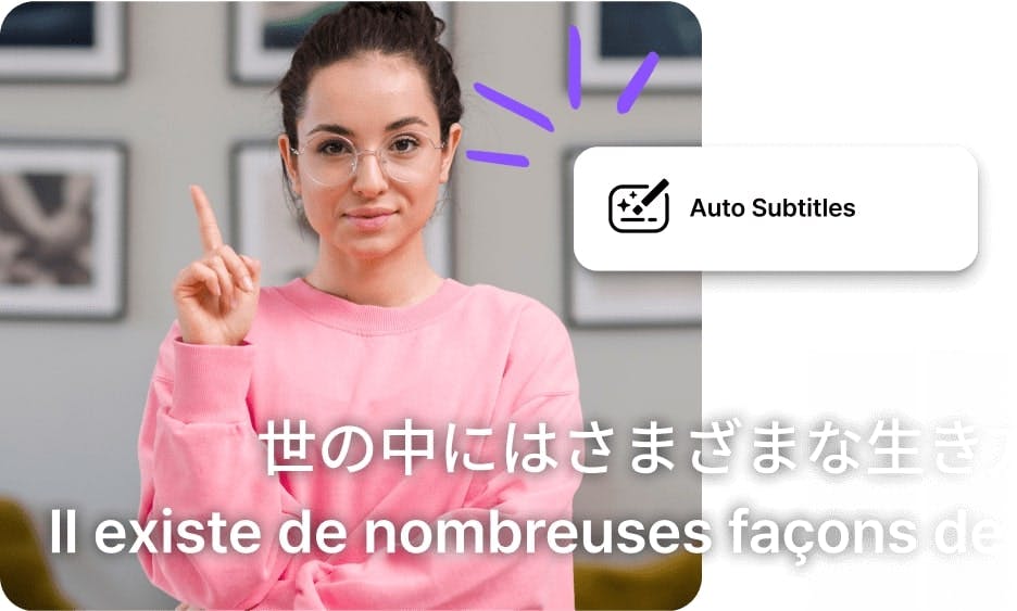 woman in pink sweater pointing up with the multilingual video to text subtitles at the bottom