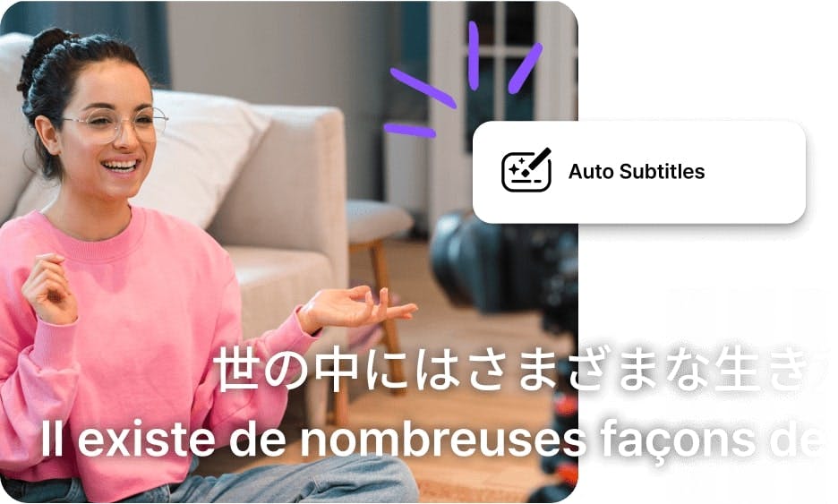 woman in pink shirt sitting in front of a sofa and multilingual audio to text subtitles shown at the bottom of the image
